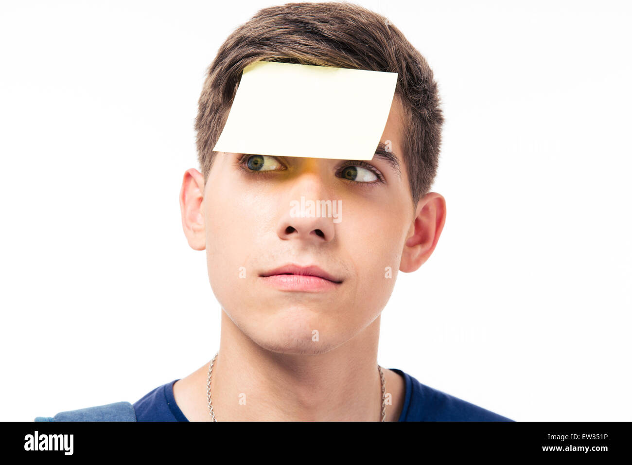 Closeup portrait of a man with sticker on forehead isolated on a white  background. Looking away Stock Photo - Alamy