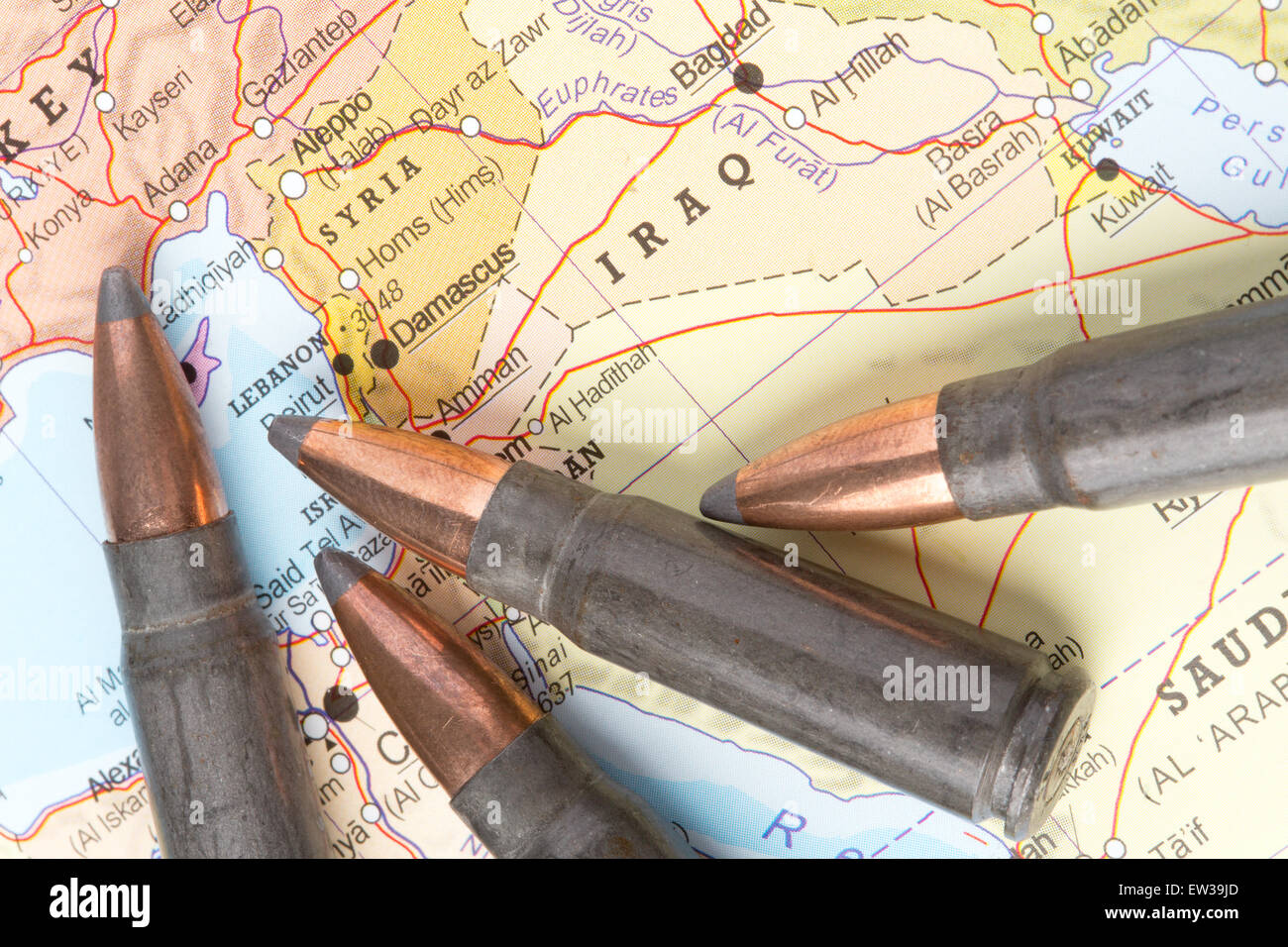 Four bullets on the geographical map of Iraq and Syria in Middle East. Conceptual image for war, conflict, violence. Stock Photo
