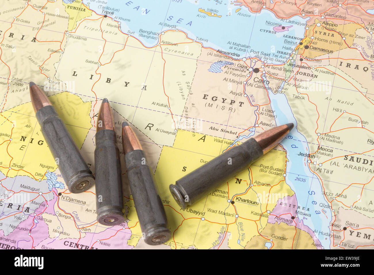 Four bullets on the geographical map of Libya and Egypt in North Africa. Conceptual image for war, conflict, violence. Stock Photo