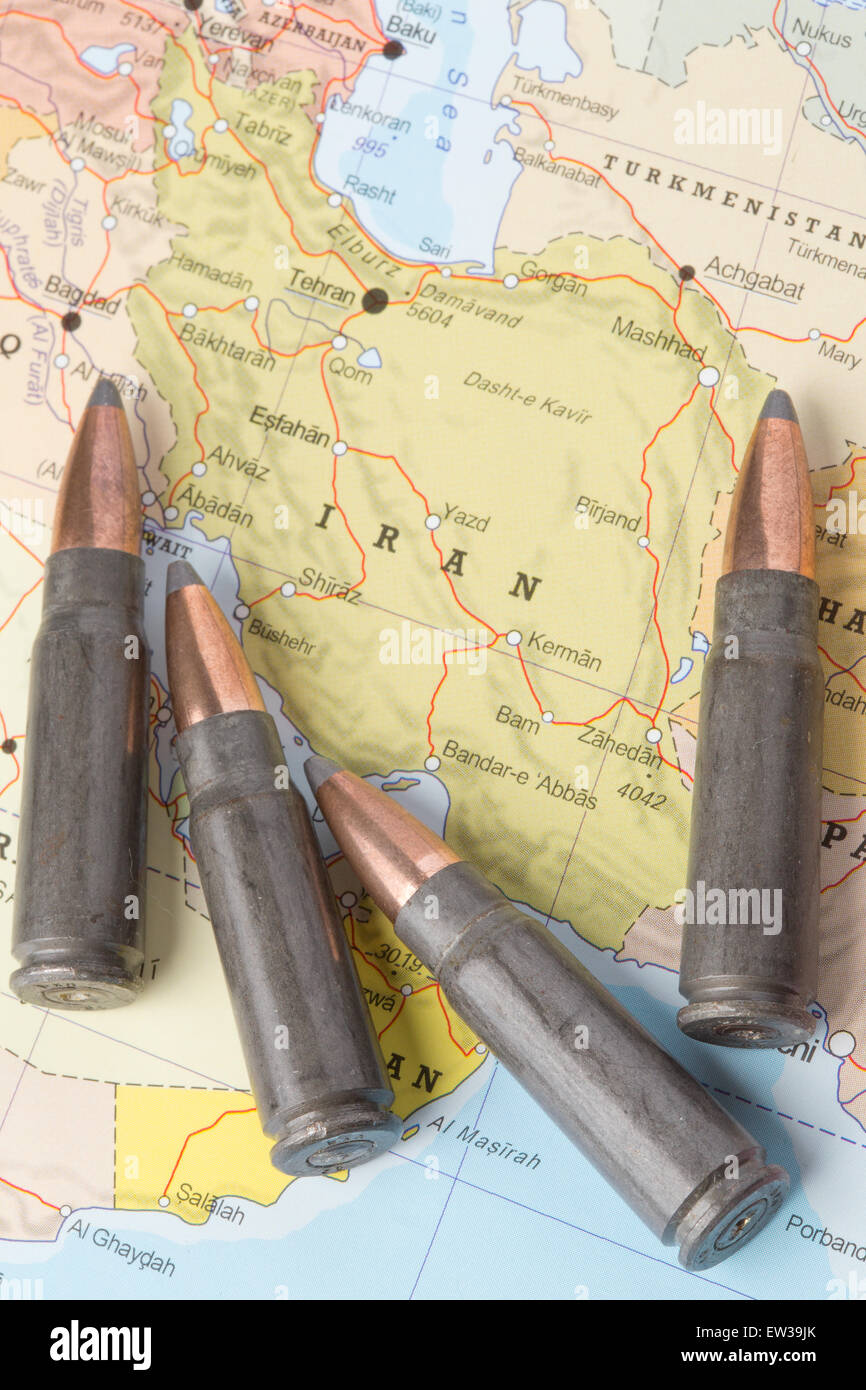 Four bullets on the geographical map of Iran. Conceptual image for war, conflict, violence. Stock Photo