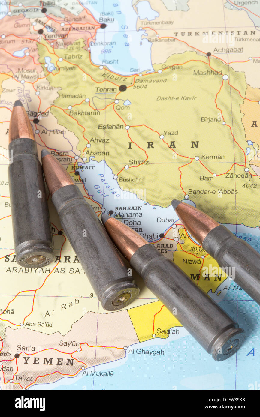 Four bullets on the geographical map of Iran. Conceptual image for war, conflict, violence. Stock Photo