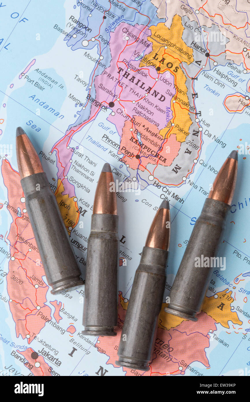 Four bullets on the geographical map of Thailand, Vietnam and Laos. Conceptual image for war, conflict, violence. Stock Photo