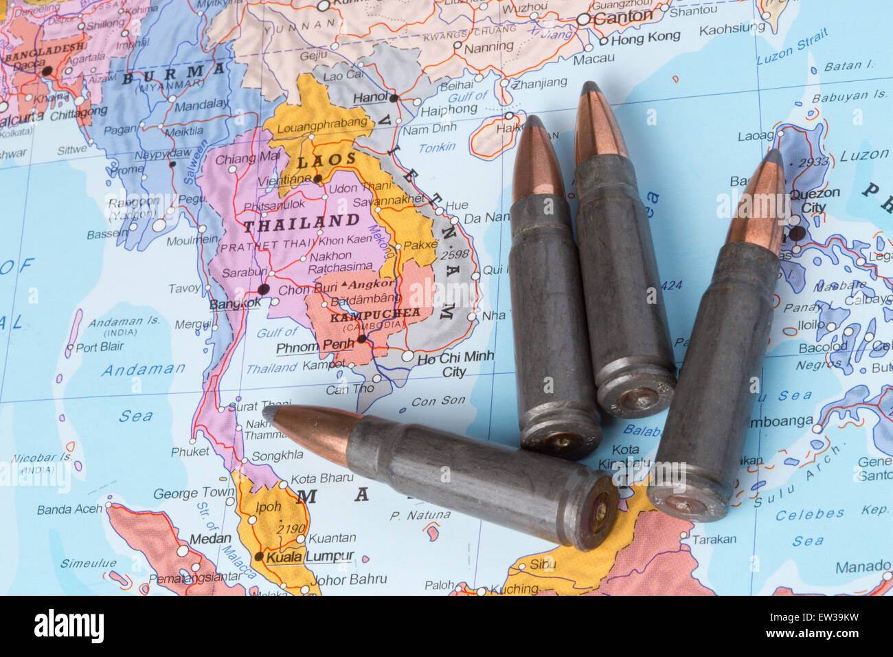 Four bullets on the geographical map of Thailand, Laos and Vietnam. Conceptual image for war, conflict, violence. Stock Photo
