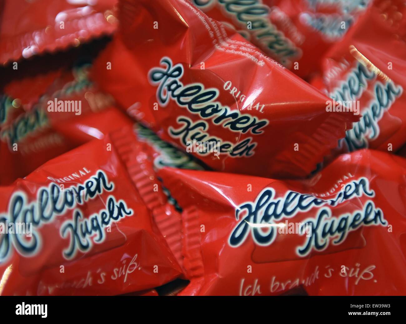 'Halloren Kugeln' candies lie on a table at the Halloren Schokoladenfabrik AG shareholders' meeting in Halle/Saale, Germany, 17 June 2015. With 200,000 euros, Halloren yielded 90 percent less in 2014 than in 2013. Photo: HENDRIK SCHMIDT/dpa Stock Photo