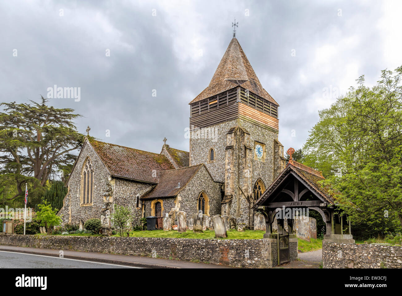 View on the lychgate leading to St Peter and St Paul church, (12th century) in the village of
