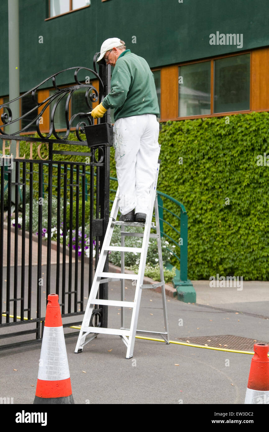 Wimbledon London,UK. 17th June 2015. The front entrance of the AELTC is repainted by ground staff in the build up to the 2015 Wimbledon tennis championships Credit:  amer ghazzal/Alamy Live News Stock Photo