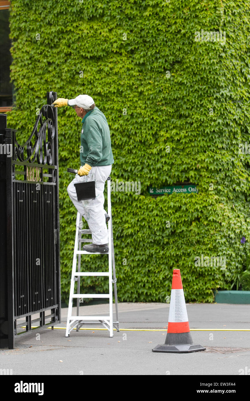 Wimbledon London,UK. 17th June 2015. The front entrance of the AELTC is repainted by ground staff in the build up to the 2015 Wimbledon tennis championships Credit:  amer ghazzal/Alamy Live News Stock Photo