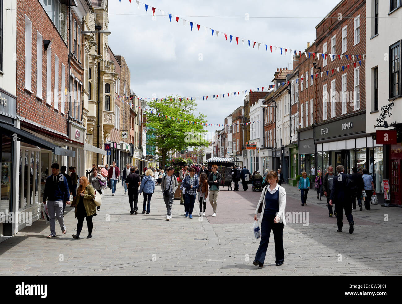 Shoppers in East Street Chichester viewed form the Market Cross West Sussex England UK Stock Photo