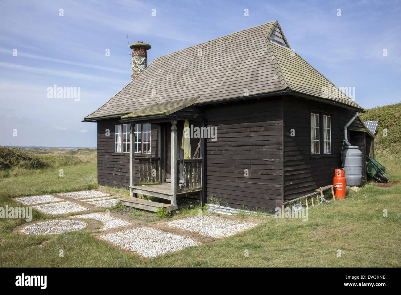 The Wardens cottage on Scolt Head Island Nature Reserve, the roof is made of cedar wood tiles. North Norfolk. The Warden's Cottage was first used by Emma Turner in 1923. Stock Photo