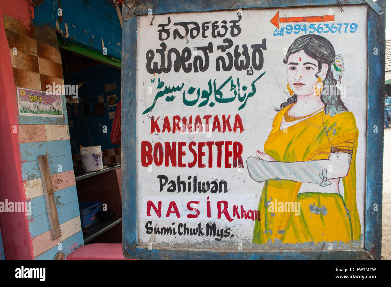 Sign for a bone setter doctor in Mysore, India Stock Photo