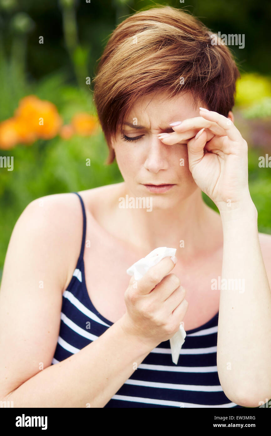 Girl with hayfever Stock Photo