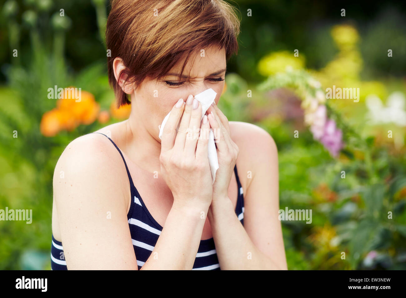 Girl with hayfever Stock Photo