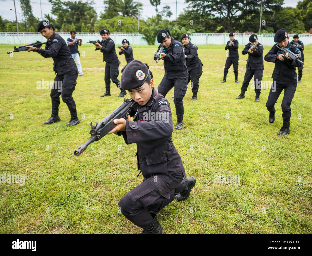 June 17, 2015 - Rangae, Narathiwat, Thailand - Thai women Rangers drill with HK33 Assault Rifles. There are 5 platoons of women Rangers serving in Thailand's restive Deep South. They generally perform security missions at large public events and do public outreach missions, like home wellness checks and delivering food and medicine into rural communities. The medics frequently work in civilian clothes because the Rangers found people are more relaxed around them when they're in civilian clothes. About 6,000 people have been killed in sectarian violence in Thailand's three southern provinces of Stock Photo