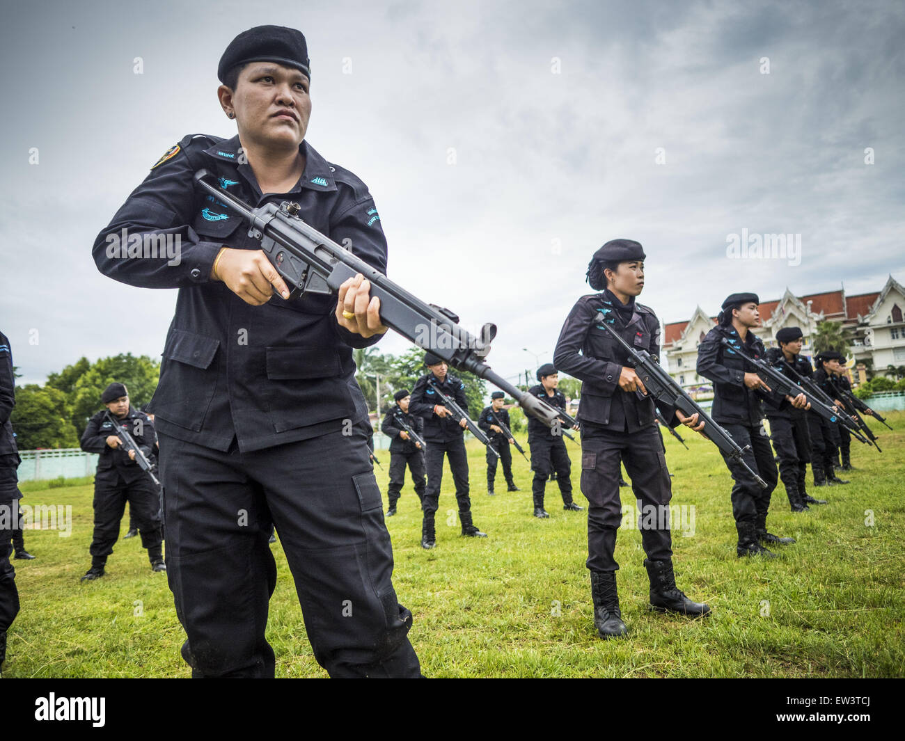 June 17, 2015 - Rangae, Narathiwat, Thailand - Thai women Rangers drill with HK33 Assault Rifles. There are 5 platoons of women Rangers serving in Thailand's restive Deep South. They generally perform security missions at large public events and do public outreach missions, like home wellness checks and delivering food and medicine into rural communities. The medics frequently work in civilian clothes because the Rangers found people are more relaxed around them when they're in civilian clothes. About 6,000 people have been killed in sectarian violence in Thailand's three southern provinces of Stock Photo