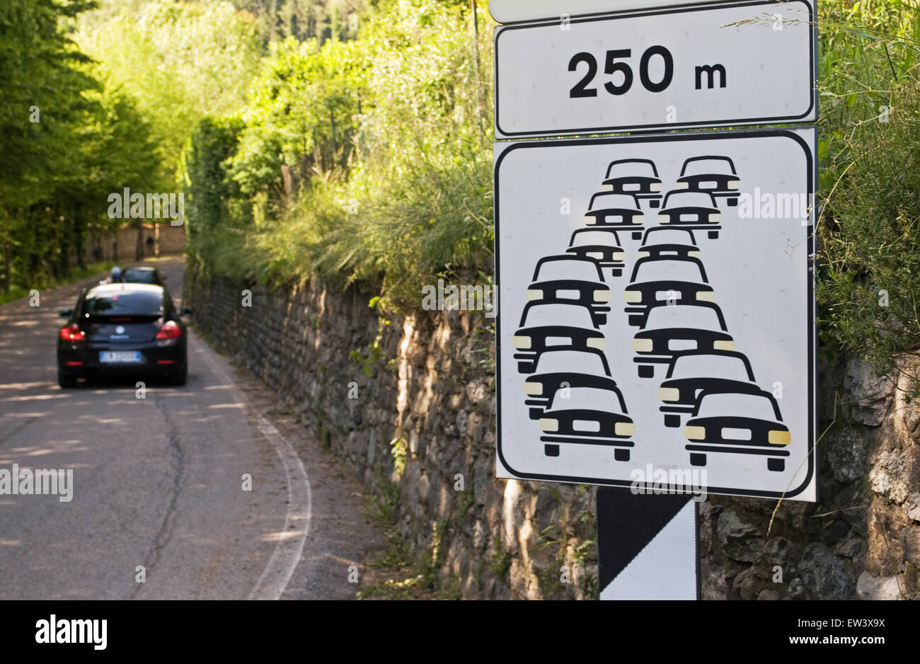 Cars queuing symbol on traffic sign, Italy Stock Photo