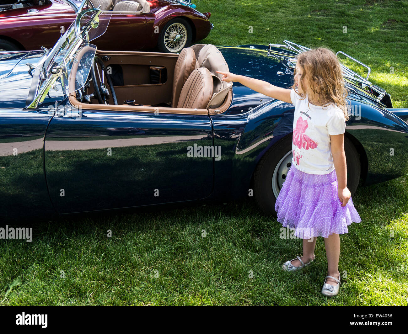 Young girl admires a '60 MGA, 63rd Annual Rallye Glenwood Springs Car Show, Glenwood Springs