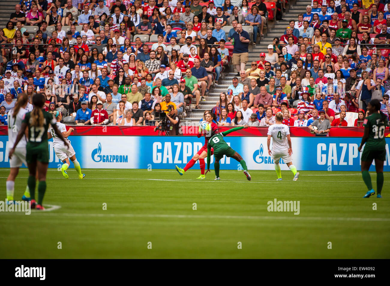 Vancouver, Canada. 16th June, 2015. United States goalkeeper Hope Solo (#1) controls the ball after a shot on goal during the opening round match between Nigeria and the United States at the FIFA Women's World Cup Canada 2015 at BC Place Stadium. The United States won the match 1-0. Credit:  Matt Jacques/Alamy Live News Stock Photo