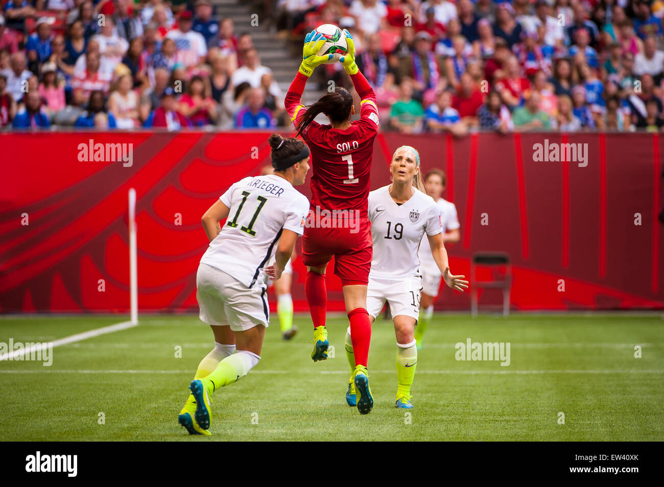 Vancouver, Canada. 16th June, 2015. United States goalkeeper Hope Solo (#1) leaps to make a save during the opening round match between Nigeria and the United States at the FIFA Women's World Cup Canada 2015 at BC Place Stadium. The United States won the match 1-0. Credit:  Matt Jacques/Alamy Live News Stock Photo