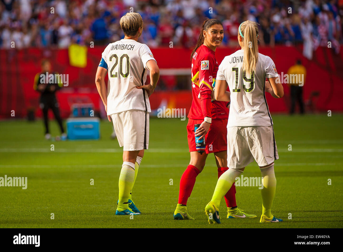Vancouver, Canada. 16th June, 2015. United States goalkeeper Hope Solo (#1) and United States defender Julie Johnston (#19) following their opening round match between Nigeria and the United States at the FIFA Women's World Cup Canada 2015 at BC Place Stadium. The United States won the match 1-0. Credit:  Matt Jacques/Alamy Live News Stock Photo