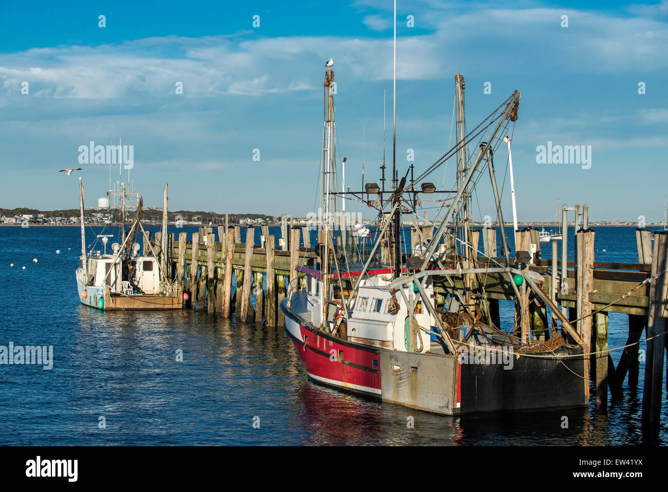 Commercial fishing boats docked at the fishing piers in Provincetown