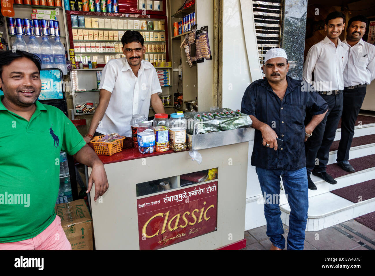Mumbai India,Tardeo,Jehangir Boman Behram Road,man men male,friends,street,convenience store,stall,sidewalk,India150303056 Stock Photo