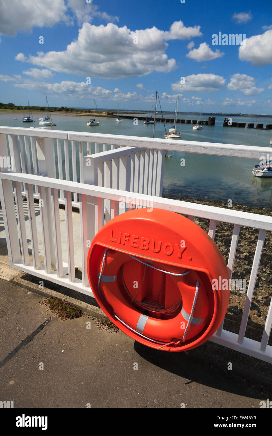 Open lifebuoy cabinet holder on bridge over harbour Stock Photo