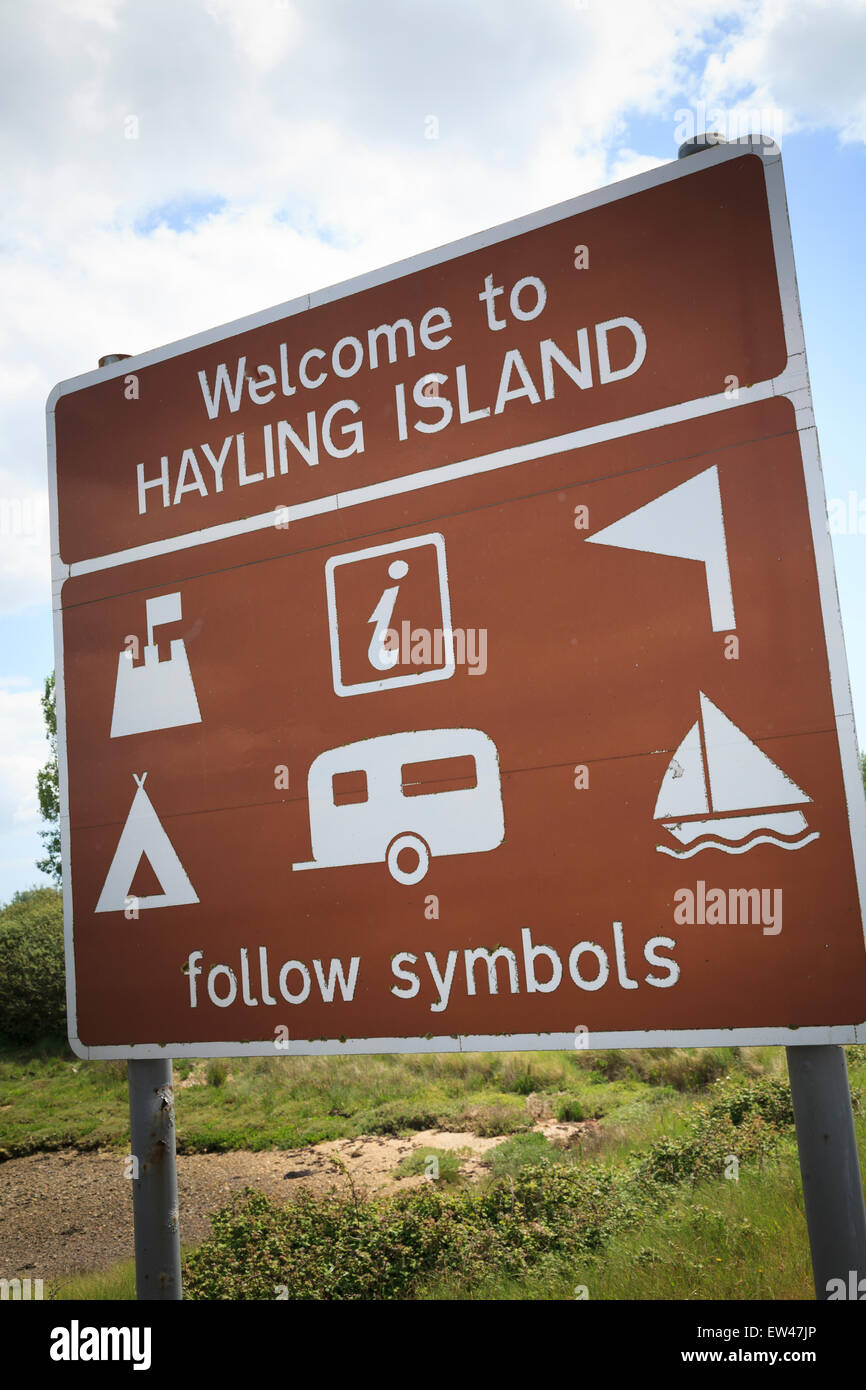 Welcome to Hayling Island brown tourists information follow symbols sign Stock Photo