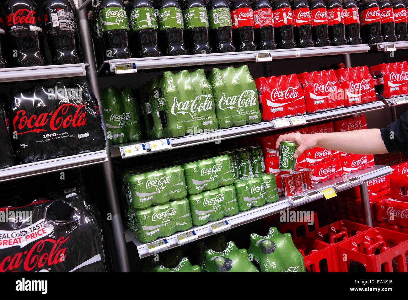 BELGIUM - MAY 2015: Coca Cola Life, a soft drink produced with stevia and sugar as sweeteners, in green package. Stock Photo