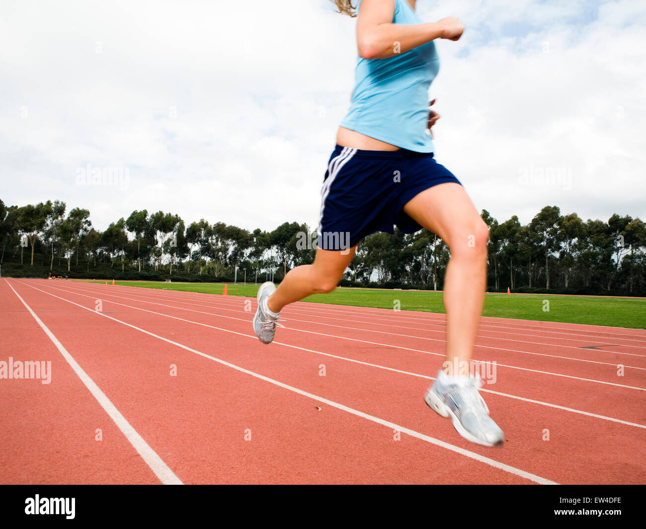 Blond woman working out at a track San Diego California. Stock Photo