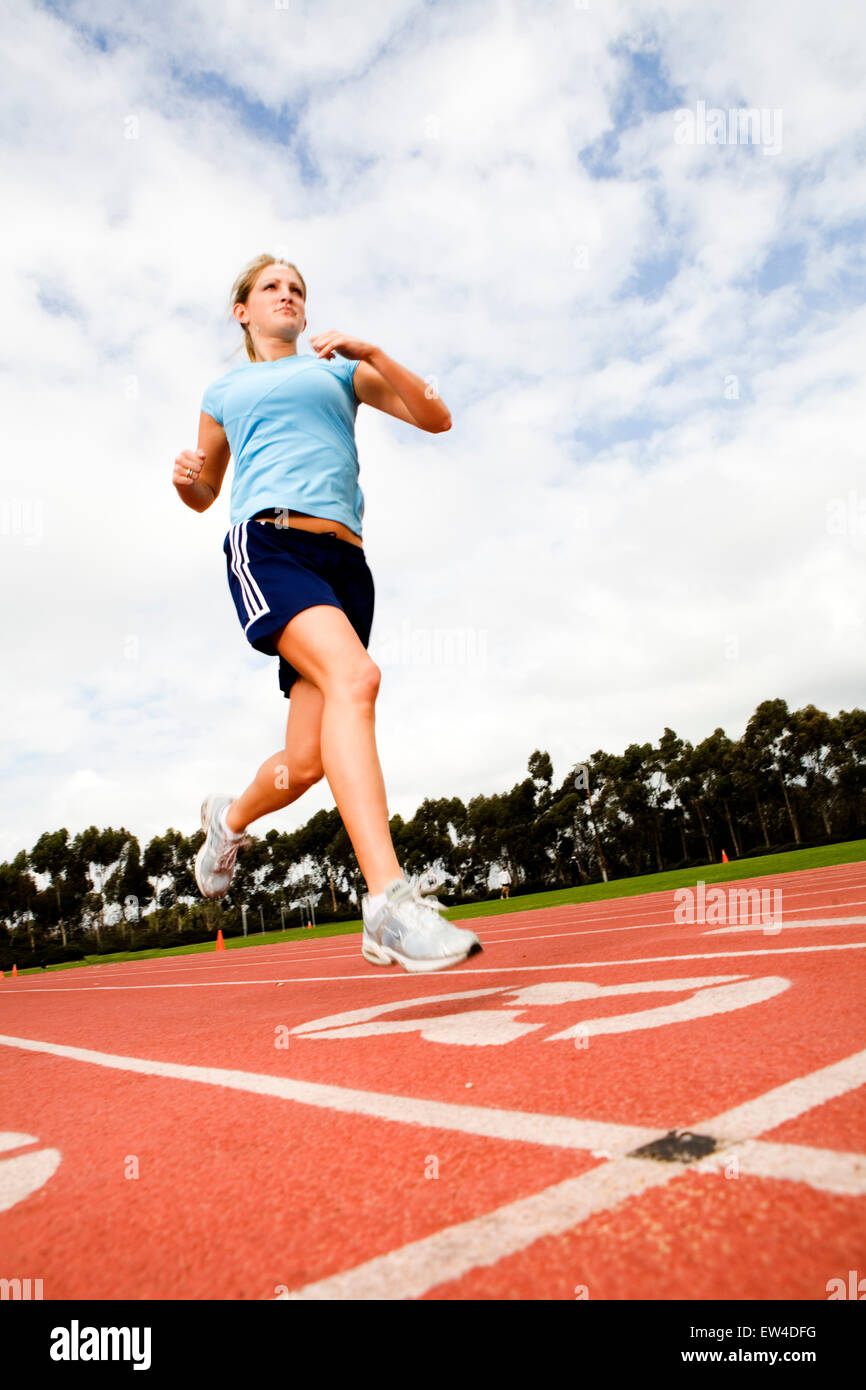 Blond woman working out at a track San Diego California. Stock Photo