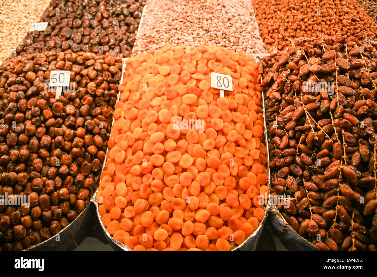 Apricots and dates amongst the fruit and nuts for sale at this street stall on ,Djemaa,Djamaa El Fna,the main square in Marrakesh/Marrak Stock Photo