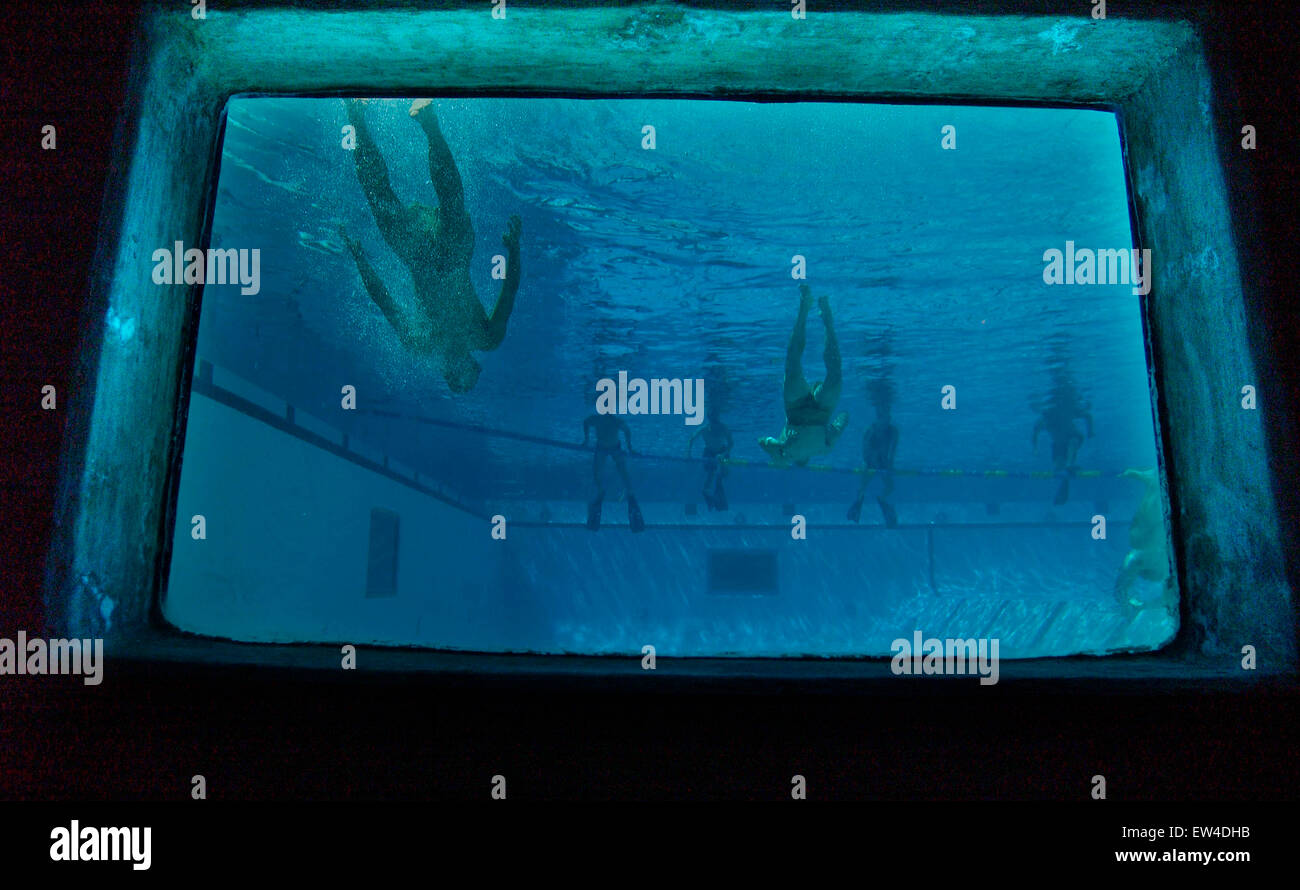 Special forces members swim in pool Stock Photo Alamy