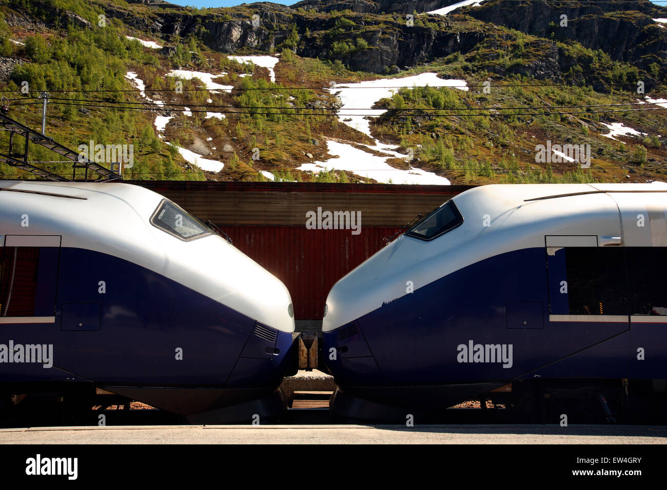 The front nose of two European trains in the mountains of Norway between Oslo and Bergen. Stock Photo