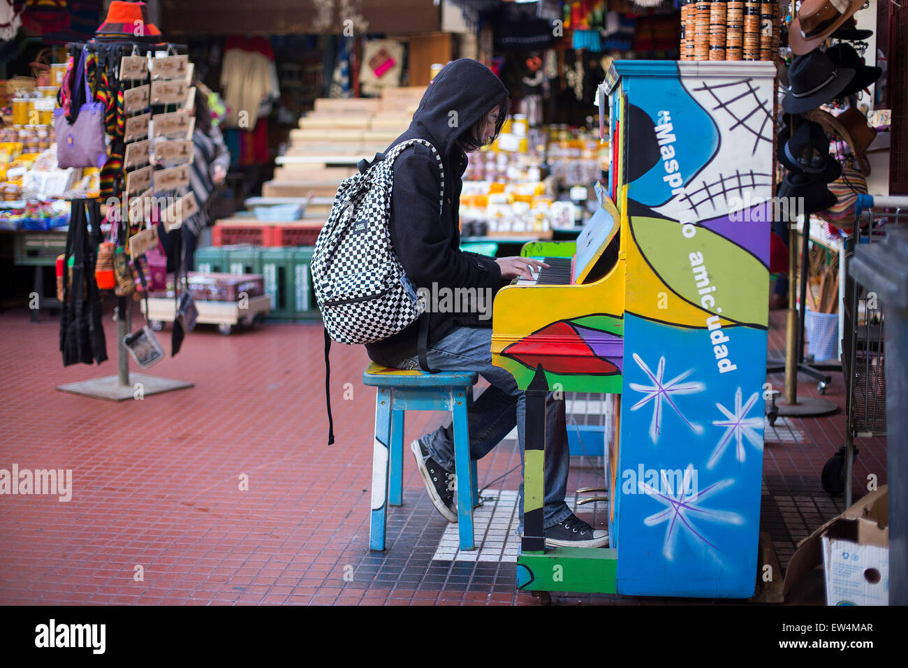 La Serena, Chile. 17th June, 2015. A person plays the piano at the market of La Recova in La Serena, Chile, on June 17, 2015. The 2015 Copa America takes place in Chile from June 11 to July 15. © Luis Echeverria/Xinhua/Alamy Live News Stock Photo