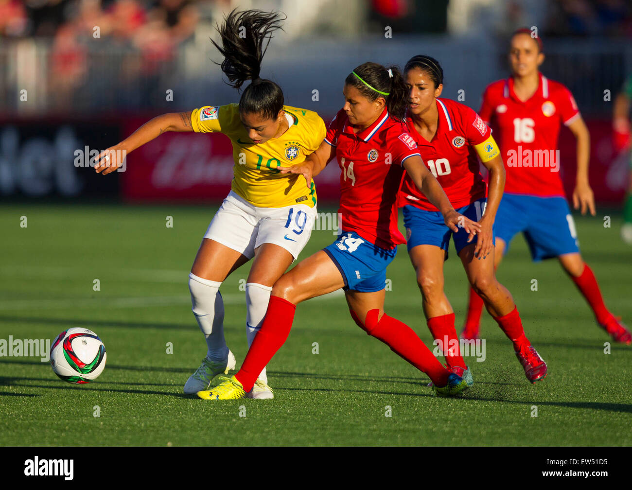 Moncton, Canada. 17th June, 2015. Maurine (1st L) of Brazil vies with Maria Barrantes (2nd L) of Costa Rica during their group E match at the 2015 FIFA Women's World Cup in Moncton, Canada, June 17, 2015. Brazil won 1-0 and advanced to the round of 16. © Zou Zheng/Xinhua/Alamy Live News Stock Photo