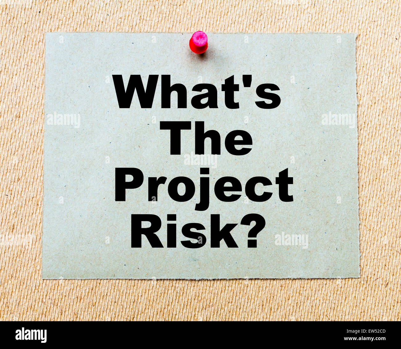 What's The Project Risk? written on paper note pinned with red ...