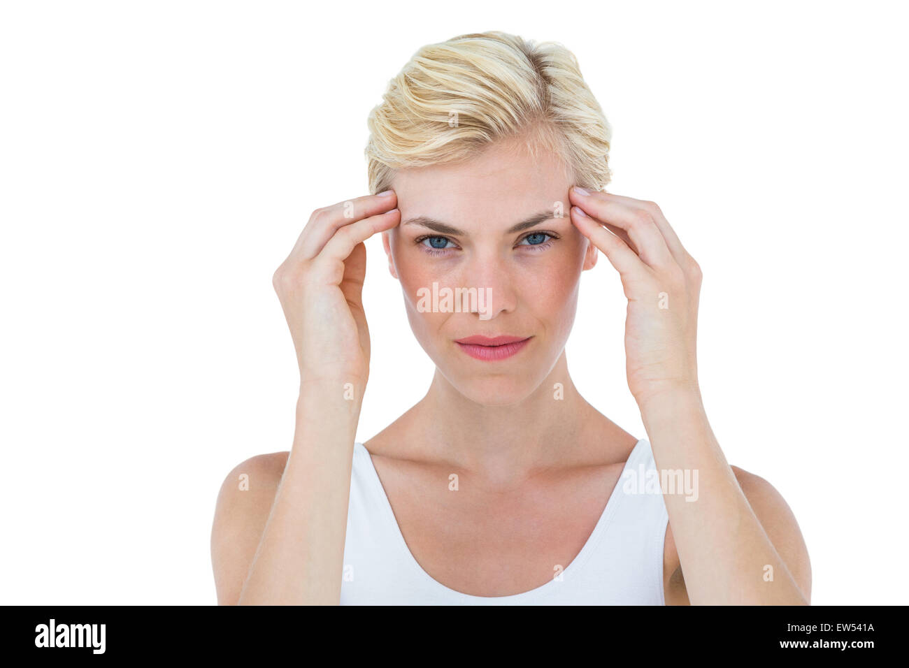 Blonde woman frowning and looking at camera Stock Photo