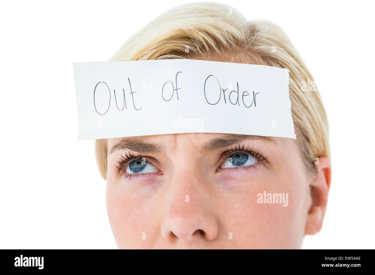 Anxious blonde woman with sign on her forehead Stock Photo