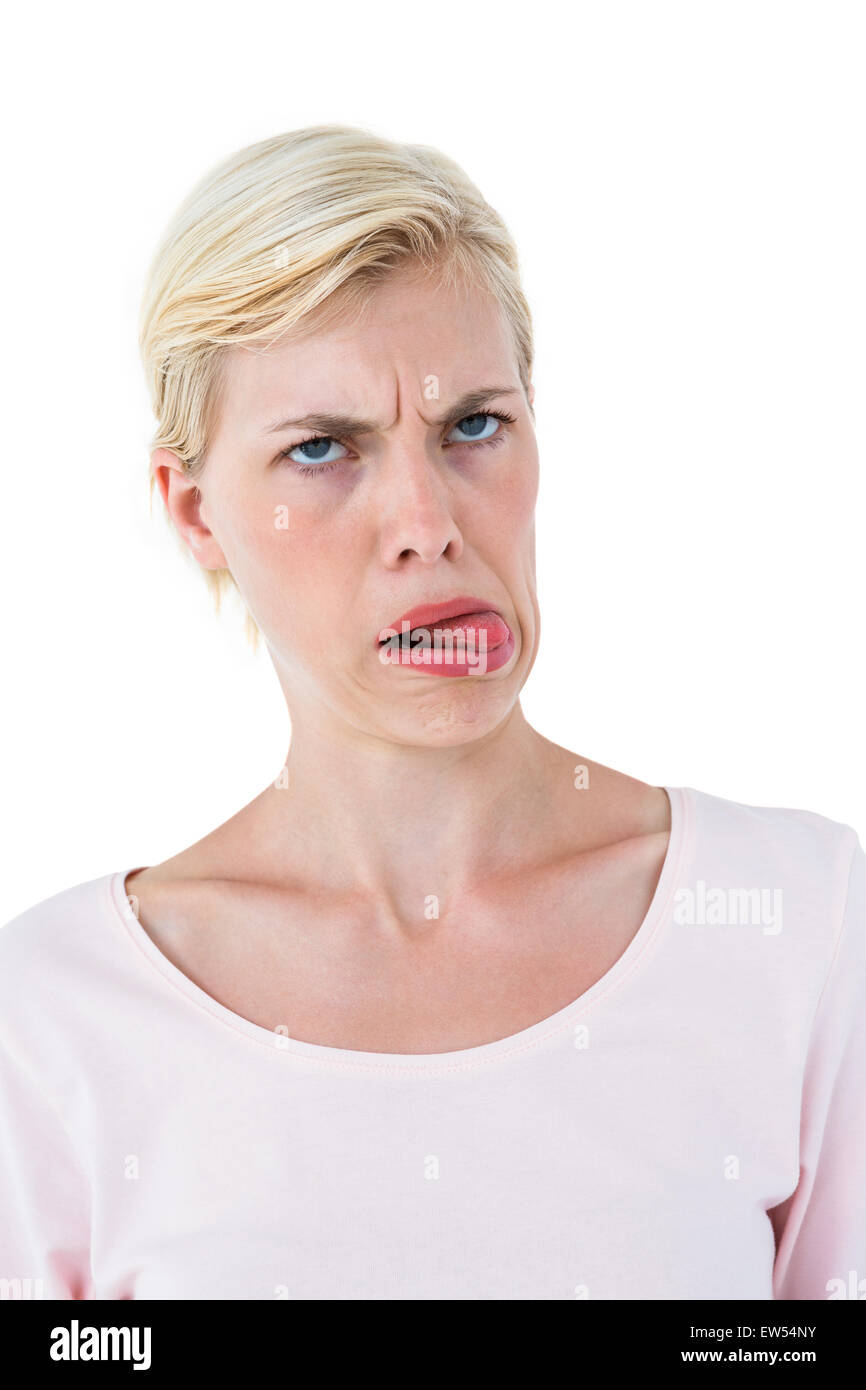 Blonde woman sticking her tongue out Stock Photo