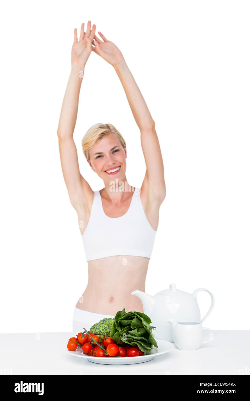 Fit woman stretching her body Stock Photo