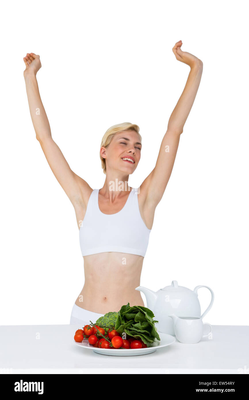 Fit woman stretching her body Stock Photo