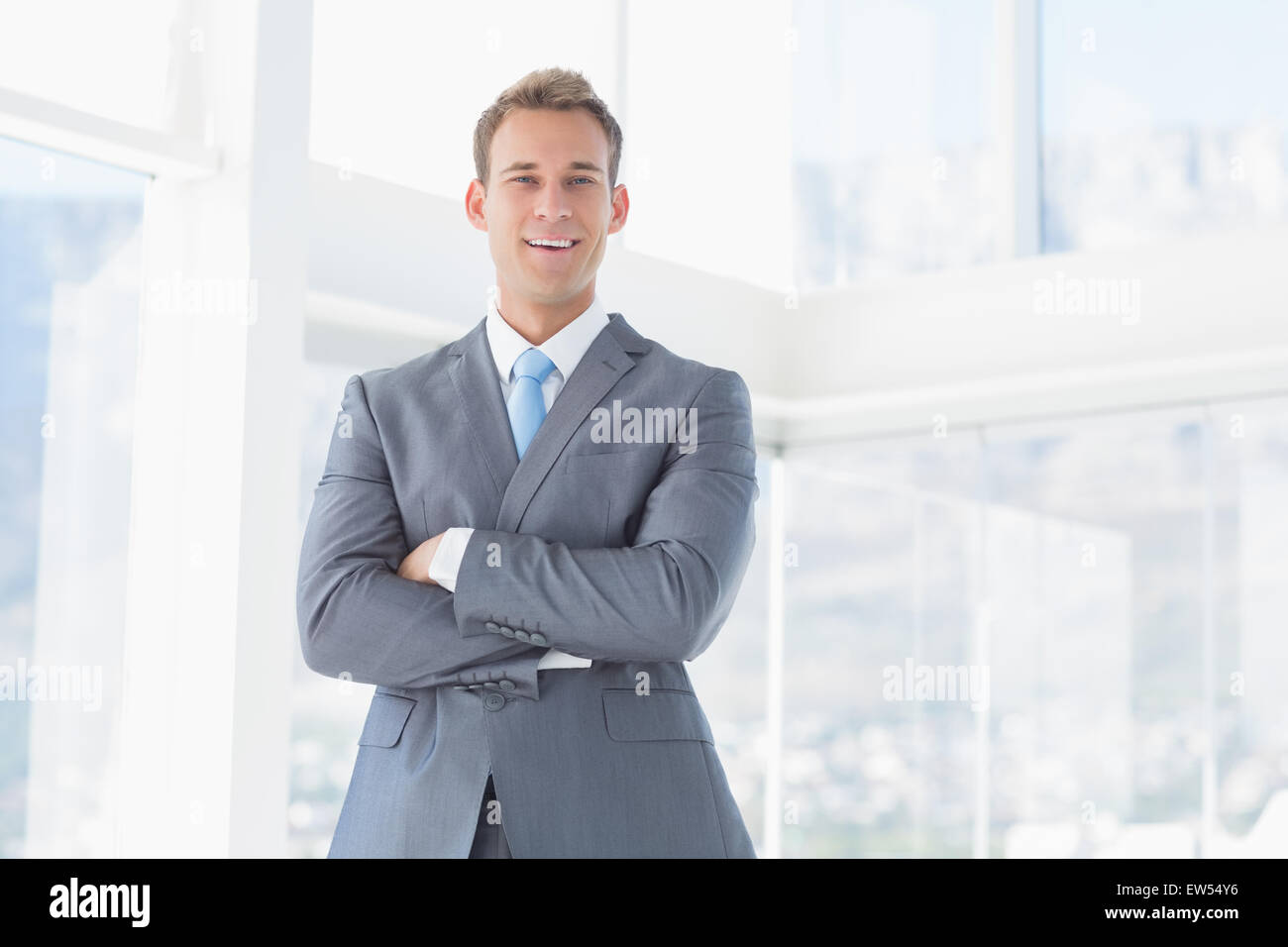 Businessman smiling looking camera hi-res stock photography and images ...