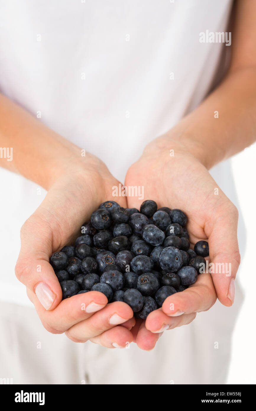 Woman holding blueberries Stock Photo