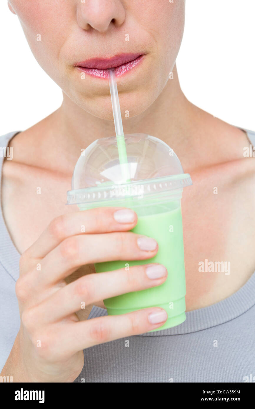 Attractive woman drinking healthy juice Stock Photo