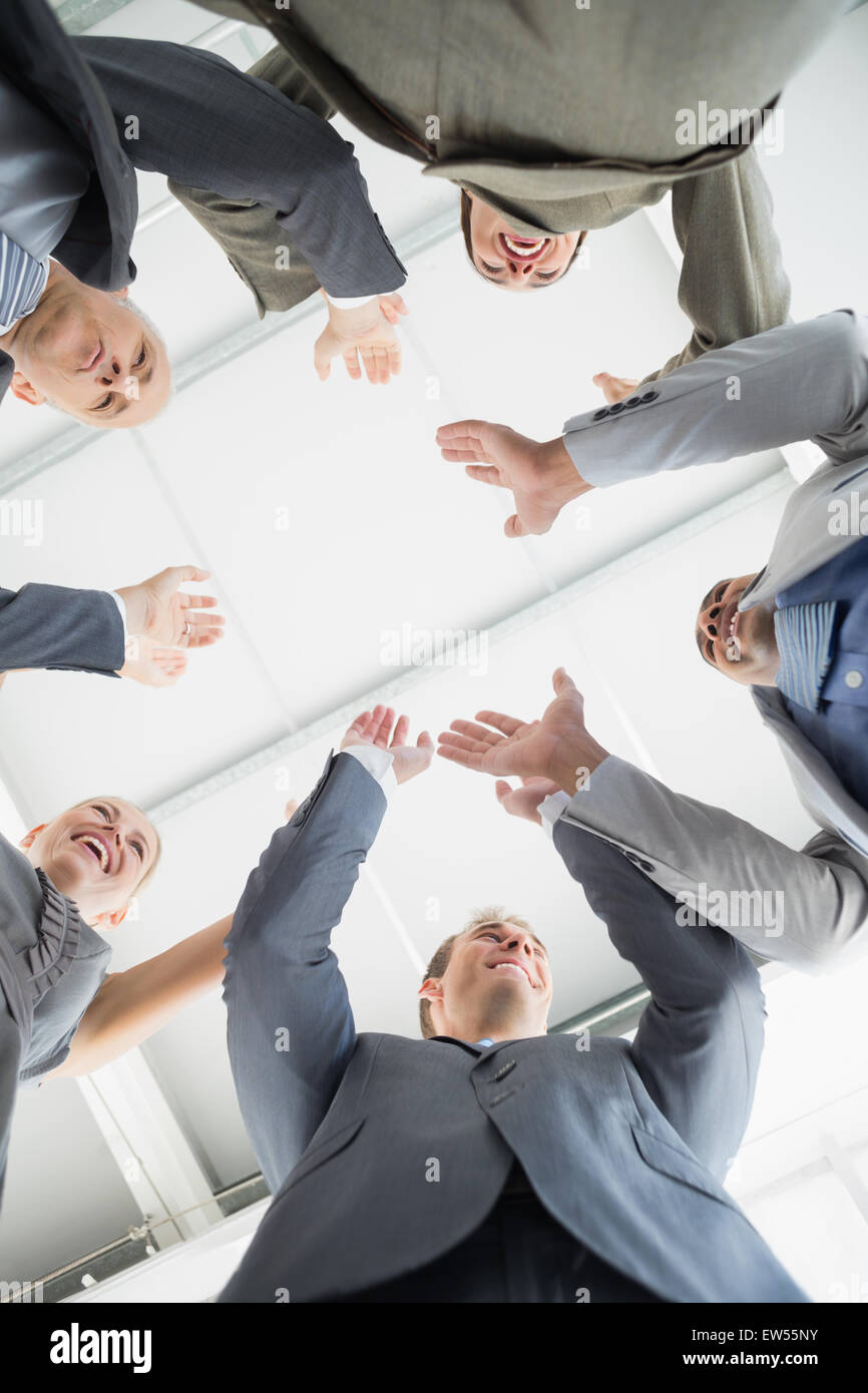 Employees celebrating a good job Stock Photo Alamy