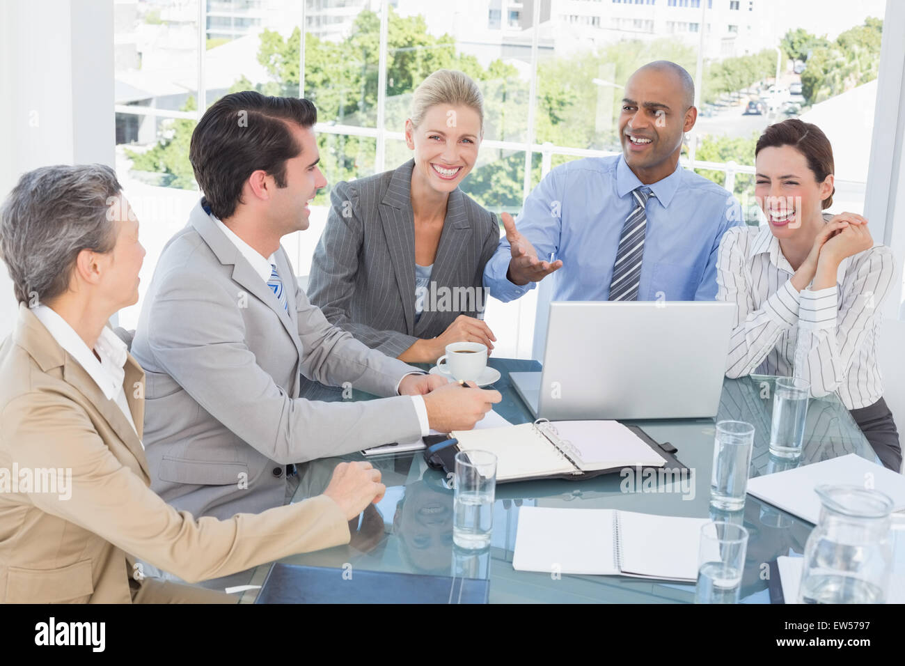 Happy business team hi-res stock photography and images - Alamy