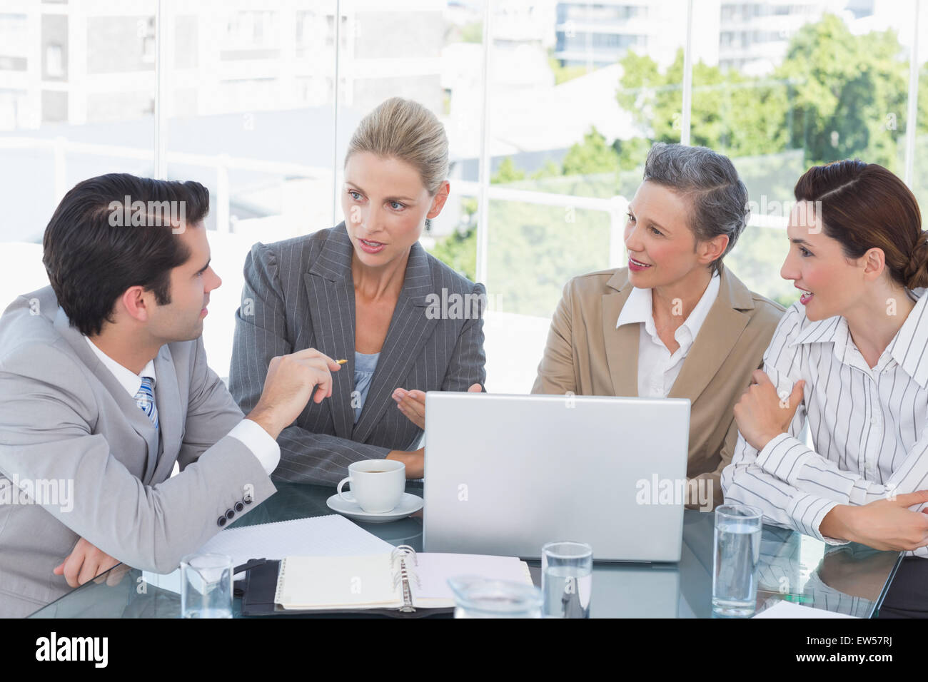 Business team working together on laptop Stock Photo - Alamy