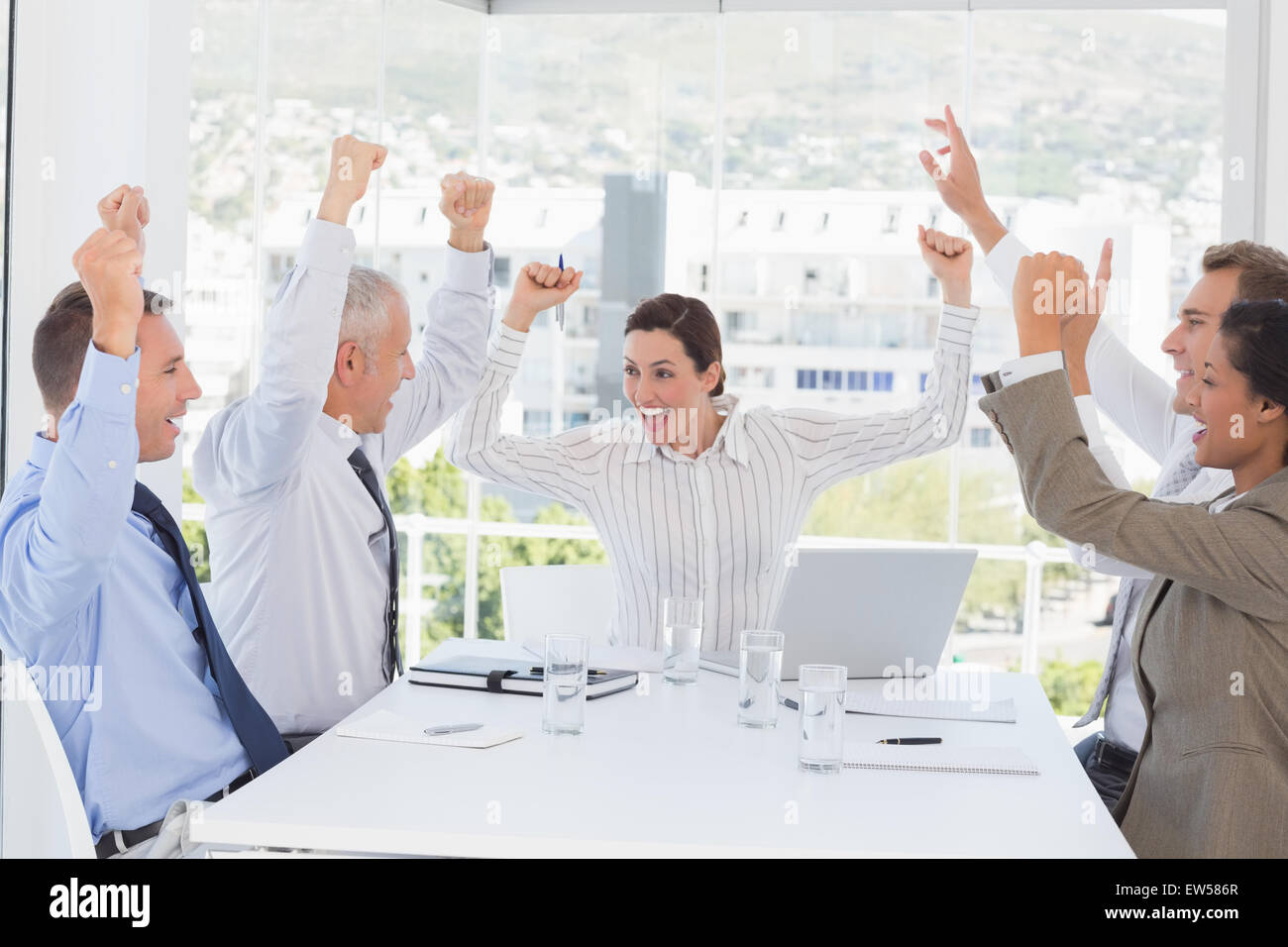 Business team celebrating a good job Stock Photo