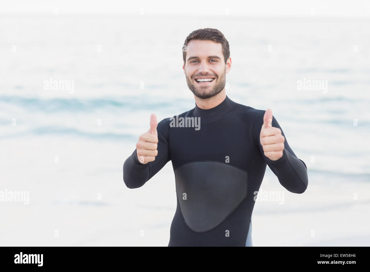 Man in wetsuit on a sunny day Stock Photo