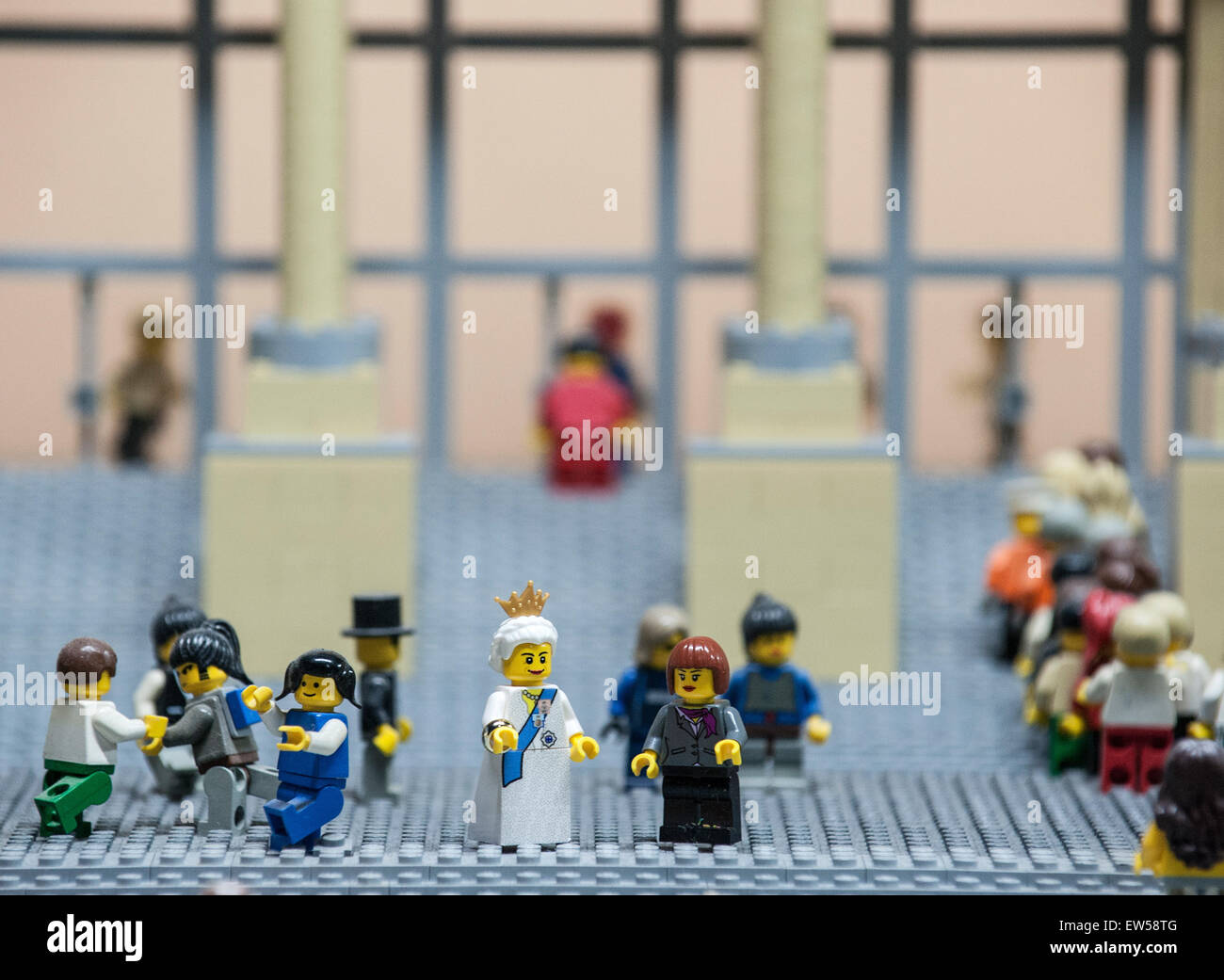 Lego figures of the British Queen (CENTER L) and German Chancellor Angela Merkel (CENTER, R